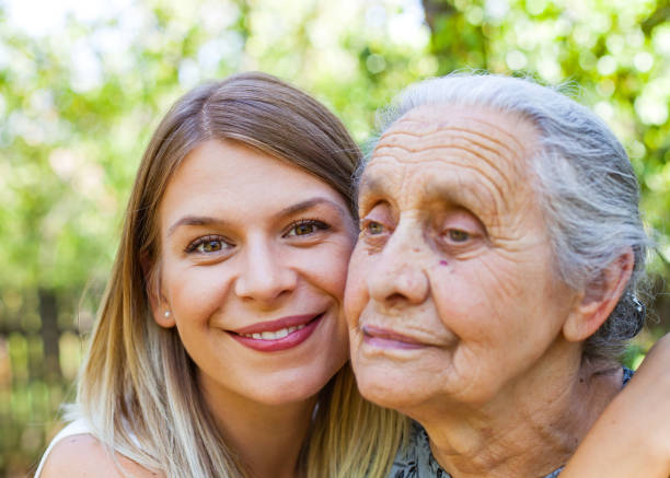 istock Hugging grandma in the park 846435932