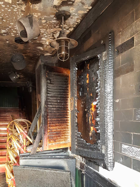 istock Burned entrance to the bar, broken windows, attack of drunken hooligans 846437684