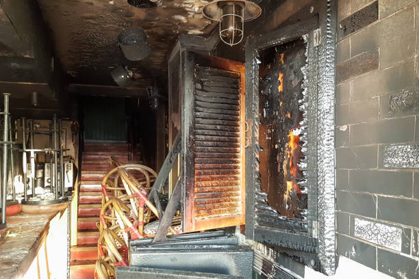 Burned entrance to the bar, broken windows, attack of drunken hooligans