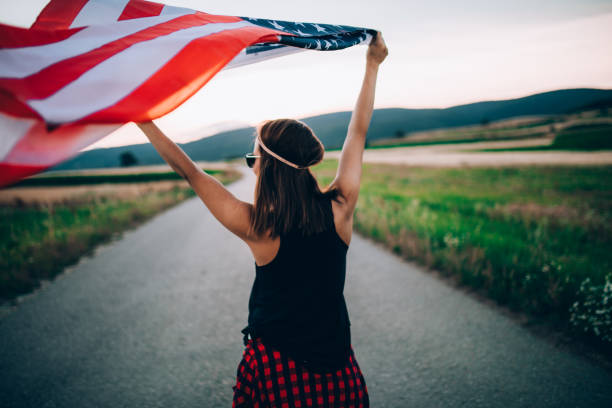 istock Hipster girl with a flag 846447376