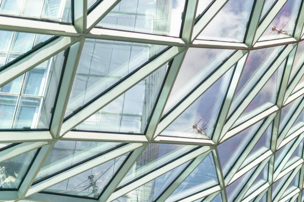 istock Abstract background construction. close-up of modern aluminum triangles on facade 846447566