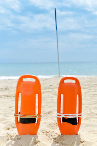 istock rescue buoys on a quiet beach 846448576