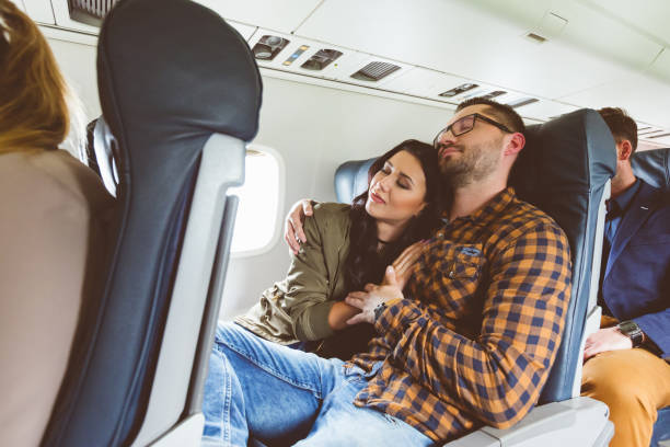 istock Couple traveling by airplane 846454366