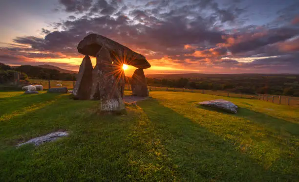 Colorful sunset over Pentre Ifan Burial chamber, Wales, England