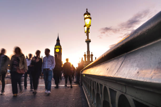 istock Westminster bridge and tourist crowd at dusk 846465406