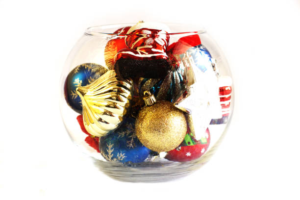 istock Christmas tree toys in a round glass vase 846466600