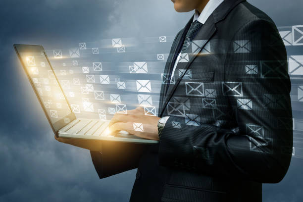 Businessman works with mail laptop.
