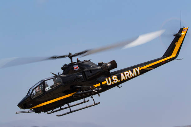 Helicopter UH-1 Cobra Army attack aircraft at the airshow Camarillo, California,USA- August 19,2017. Helicopter UH-1 Cobra fighter aircraft at the 2017 Camarillo Airshow outside of Los Angeles. The 2017 Camarillo Airshow features 2 days of aerial performances of vintage aircraft. uh 1 helicopter stock pictures, royalty-free photos & images