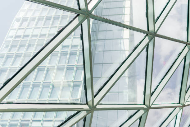 istock Abstract background construction. close-up of modern aluminum triangles on facade 846485832