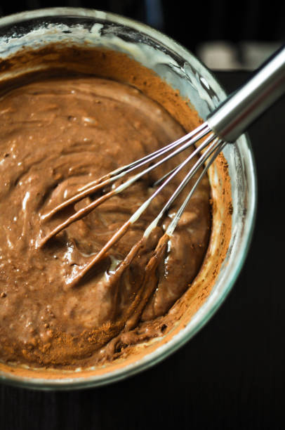 istock Dough for crepes or pancakes in glass bowl top view 846488732