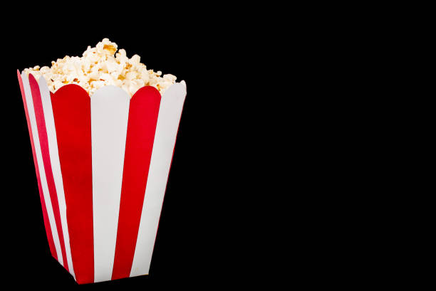 istock Box of popcorn on black background and space for text 846488862