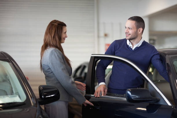 istock Woman opening car door 846489056