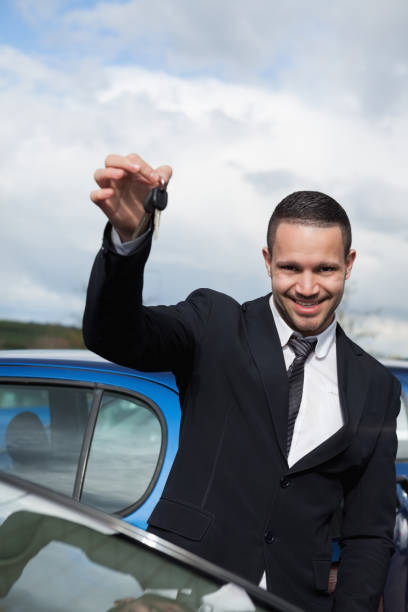 istock Happy man holding car keys 846489468