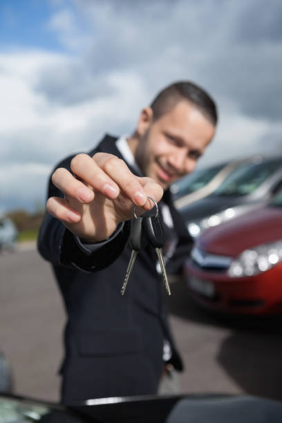 istock Happy businessman holding car keys 846489528