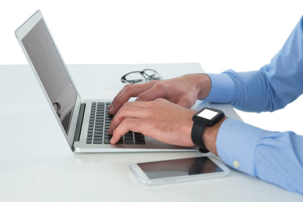 istock Cropped image of businessman working on laptop at table 846492480