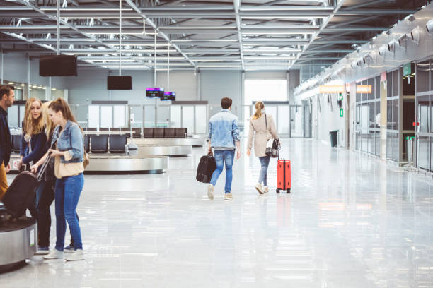 istock Passengers walking to board flight in airport 846493004