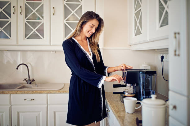 istock Young woman is making her morning coffee 846496076