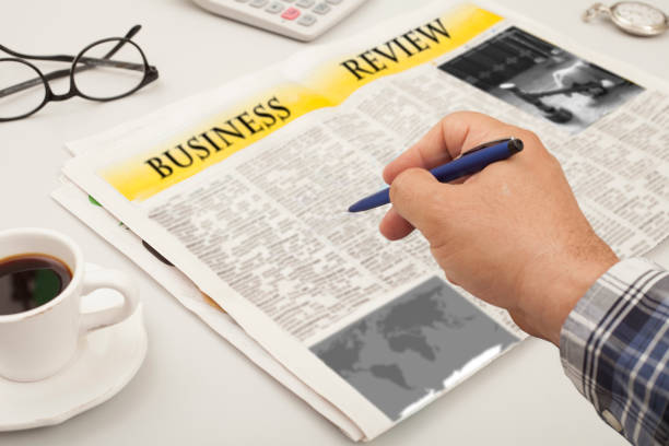 istock seeking for job at newpaper 846514562