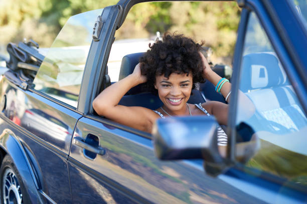 istock Young woman relaxing in car during road trip 846519112