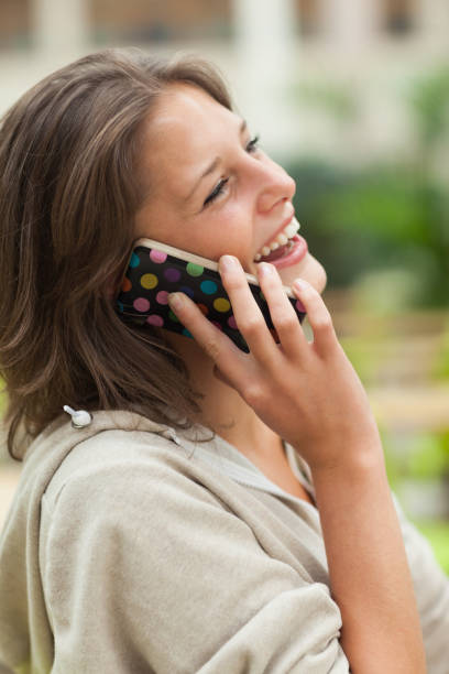 istock Side view of a cheerful woman using mobile phone 846524950