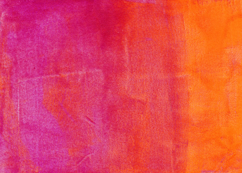 An hand painted background. The prominent colors are shades of vibrant shades of yellow, orange and pink There is a slight gradient of color with mottled texture throughout the painting.