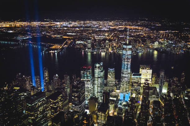 September 11th — Tribute in Light. New York, NY USA Photograph taken from a helicopter on September 11th. Light beacon display "Tribute in Light" to the struggle against world terrorism statue photos stock pictures, royalty-free photos & images