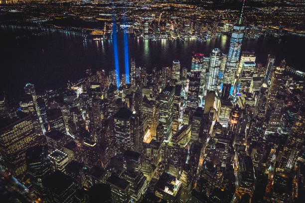 September 11th — Tribute in Light. New York, NY USA Photograph taken from a helicopter on September 11th. Light beacon display "Tribute in Light" to the struggle against world terrorism statue photos stock pictures, royalty-free photos & images