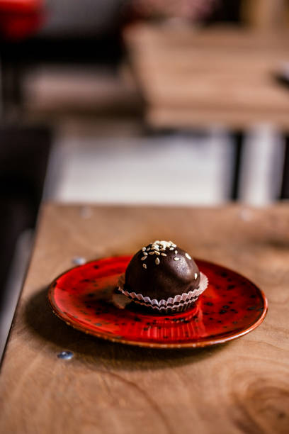 istock Vegan chocolate truffle on a red plate 846542498