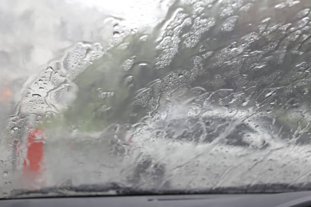 istock Photo blurred car mirror with rain water flow to down for design abstract background. 846562330