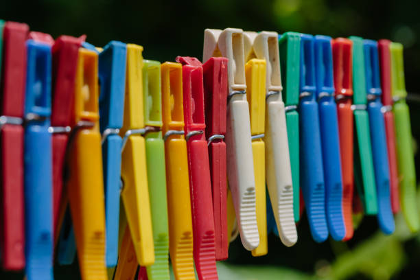 istock Colorful group of clothespins on a rope 846570266