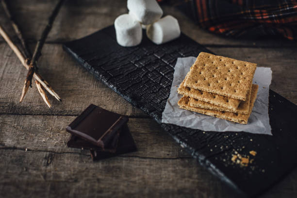 Graham crackers, chocolate and marshmallows for smores stock photo