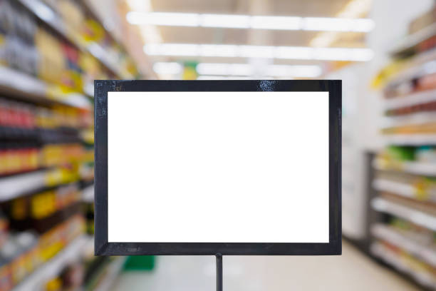 istock blank board with blur supermarket for background 846584322
