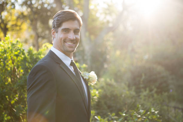 istock Portrait of handsome bride standing by plants 846590512