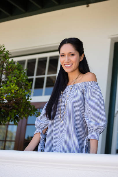 istock Confident young woman standing in cafe 846605396