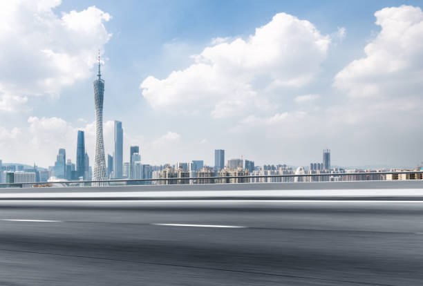 istock empty asphalt road with cityscape of modern city 846610090