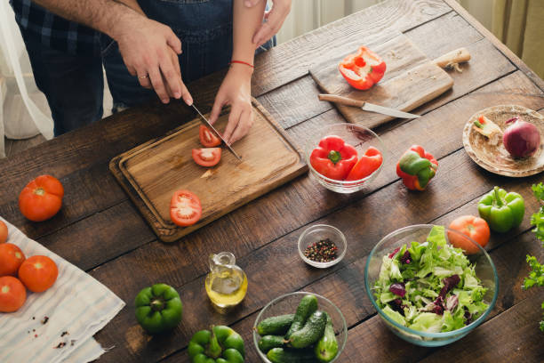 istock loving husband and wife is cooking dinner in home kitchen 846615796
