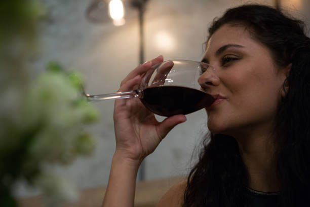 istock Beautiful woman having red wine 846624934