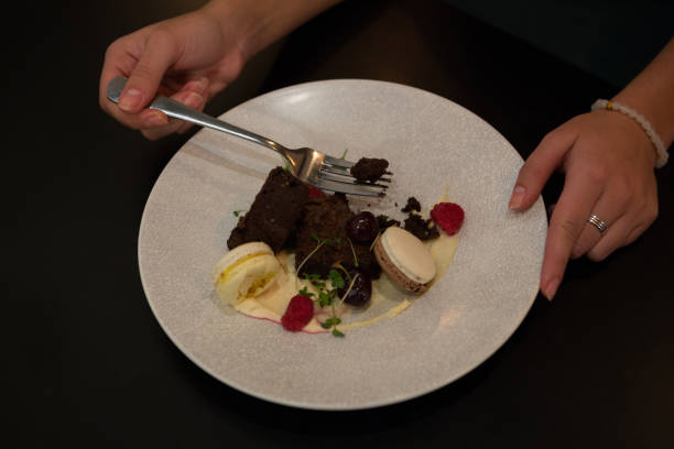 istock Woman having dessert at table 846625192