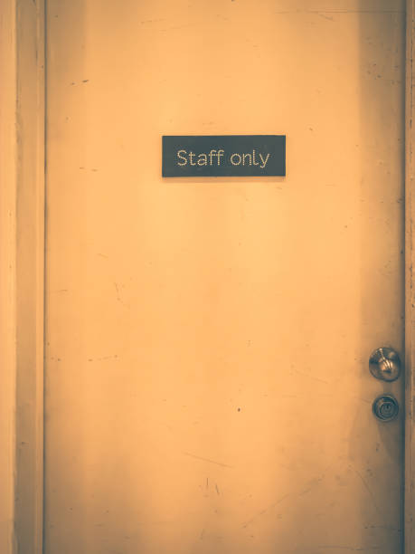 istock Staff only sign on a old door. Vintage tone 846629142