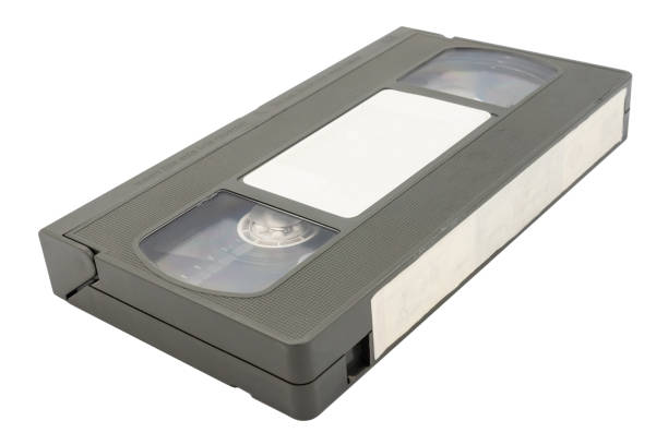istock Old video cassette tape on white background. 846629154