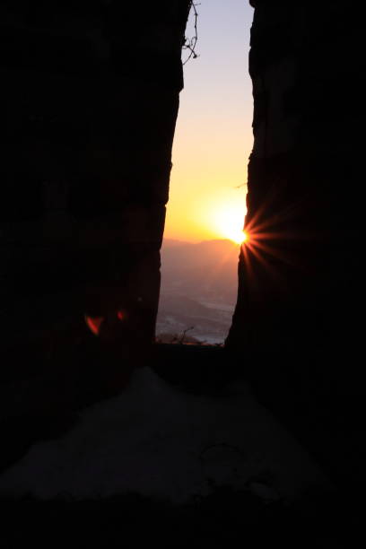 istock Sunset through the city walls 846630018