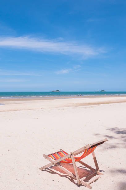 istock Red canvas chair on the beach. 846635900
