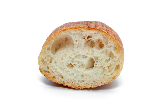 istock a slice of french bread isolated on white background 846635964