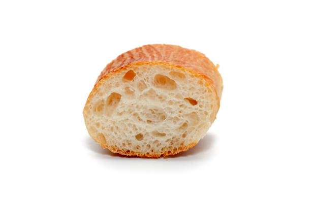 istock a slice of french bread isolated on white background 846636372