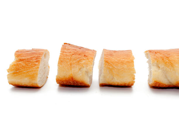 istock a slice of french bread isolated on white background 846636784