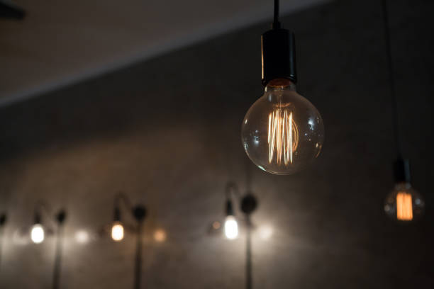 istock Close-up of illuminated bulb 846645882
