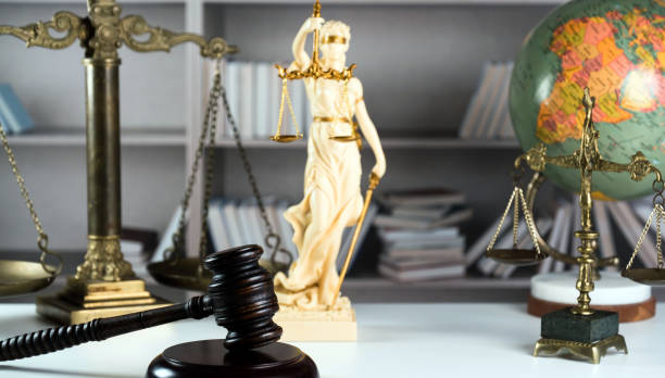 istock Law symbols on law books background 846646970