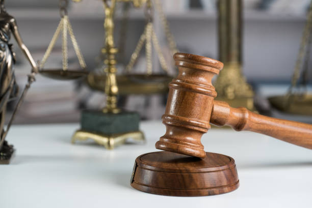 istock Law symbols on law books background 846646976