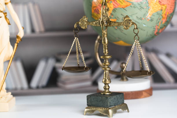 istock Law symbols on law books background 846649902