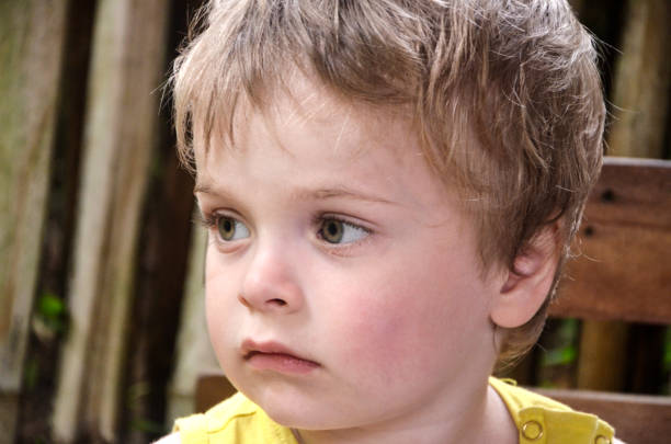 istock Boy 3 years old, blond in yellow T-shirt 846653230